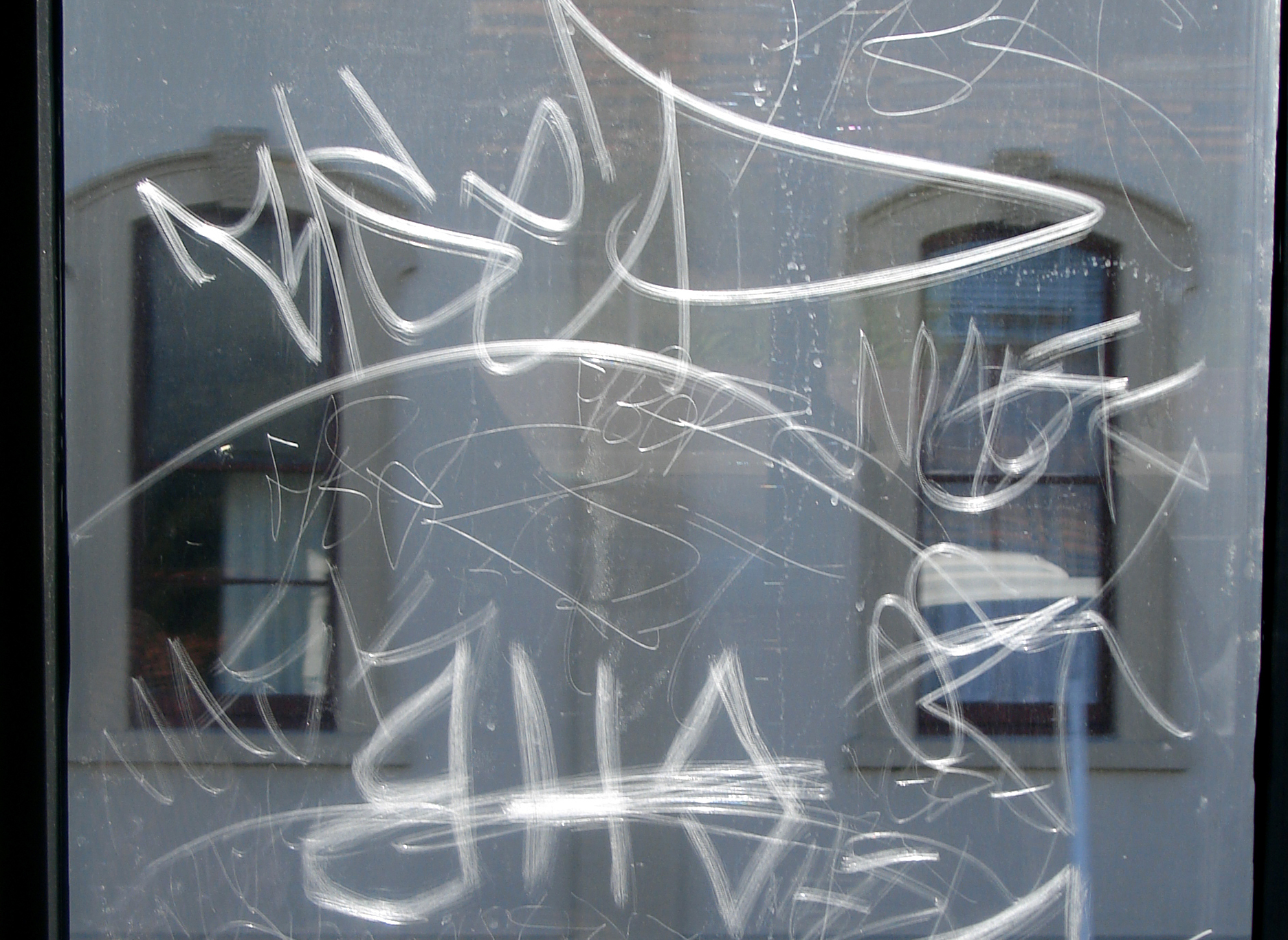 anti-graffiti-window-film-scratches Film in Orange County